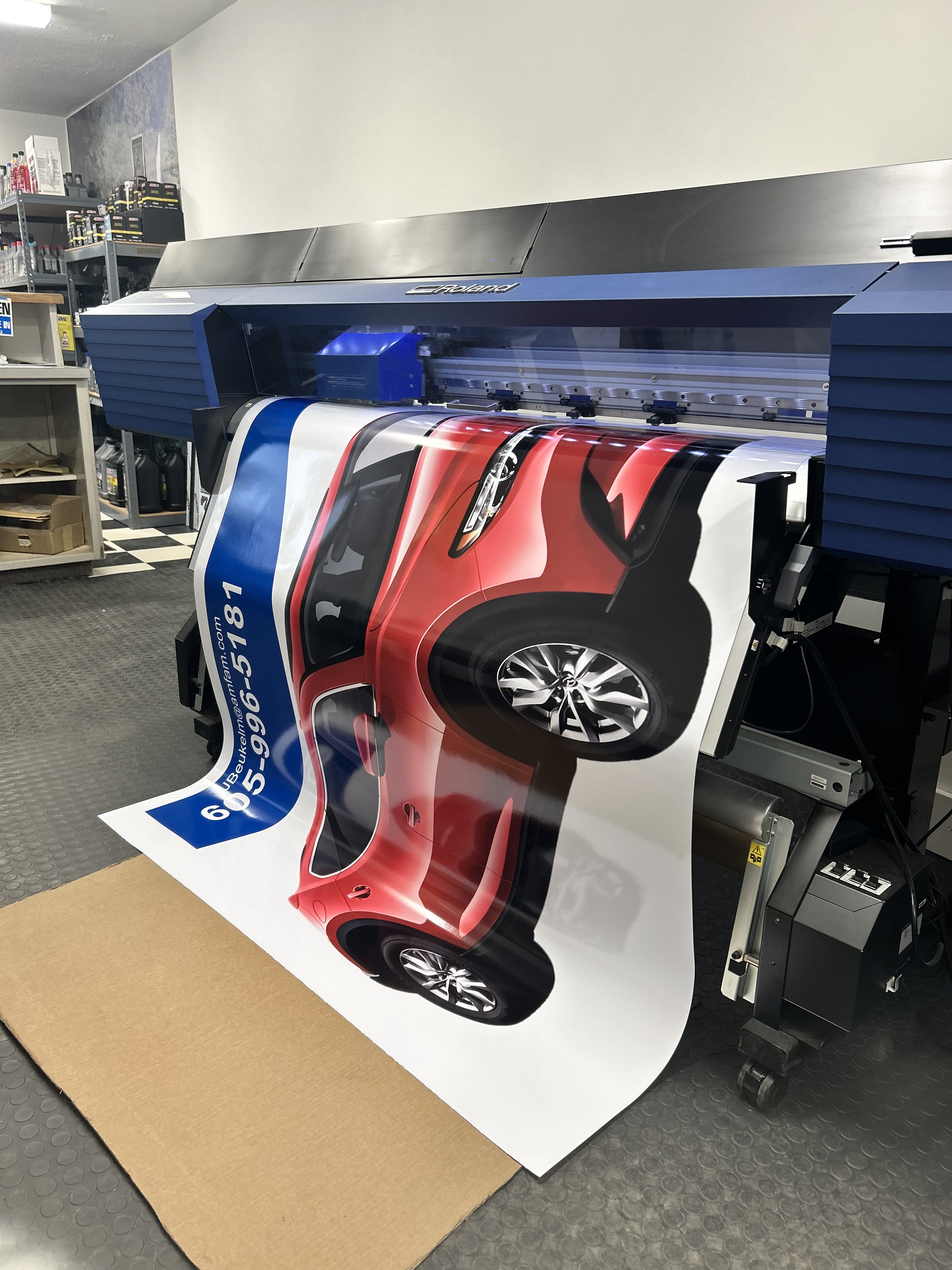 Roland printer producing a full-color print